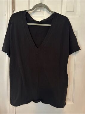 Classic Black V-Neck Tee Very soft fabric. NEVER WORN.